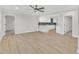 Spacious living area with hardwood floors and open kitchen at 919 Fiske St, Durham, NC 27703