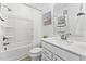 Well lit bathroom featuring shower and bath, toilet, and vanity with framed mirror and decor at 101 Ailey Brook Way # 100, Wake Forest, NC 27587