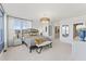 Bright bedroom featuring black metal bed frame, white walls, and side tables with lamps at 101 Ailey Brook Way # 100, Wake Forest, NC 27587