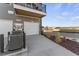 View of gray home featuring two car garage, driveway, air conditioning unit and landscaped yard at 101 Ailey Brook Way # 100, Wake Forest, NC 27587