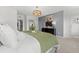 Comfortable bedroom features plush carpet, stylish decor, and a queen-sized bed with white linens at 105 Ailey Brook Way # 100, Wake Forest, NC 27587