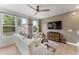 Spacious living area with large windows and a modern aesthetic at 105 Ailey Brook Way # 100, Wake Forest, NC 27587