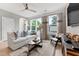 Bright living room with comfortable seating, modern decor, and large windows at 105 Ailey Brook Way # 100, Wake Forest, NC 27587