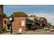 Street view showcases brick buildings and street clock in the historic downtown area at 105 Ailey Brook Way # 100, Wake Forest, NC 27587