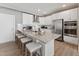 New kitchen offers granite counters, stainless appliances, and a breakfast bar at 109 Ailey Brook Way # 100, Wake Forest, NC 27587