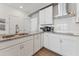 Well-lit kitchen featuring ample cabinets, granite counters, stainless appliances, and modern finishes at 109 Ailey Brook Way # 100, Wake Forest, NC 27587