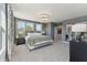 Bright primary bedroom with large windows, neutral decor, and access to a walk-in closet at 109 Ailey Brook Way # 100, Wake Forest, NC 27587