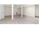 Spacious unfinished basement with vinyl flooring and neutral walls at 117 London Plain Ct, Cary, NC 27513