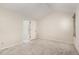 Bedroom with neutral carpeting and access to a bathroom at 117 London Plain Ct, Cary, NC 27513