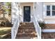 Brick steps lead to the front door of this charming house at 117 London Plain Ct, Cary, NC 27513