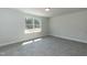 Bedroom with neutral carpet, a window, and fresh paint at 128 High Hampton Way, Fuquay Varina, NC 27526