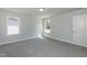 Bedroom with neutral carpet, natural light, and a view at 128 High Hampton Way, Fuquay Varina, NC 27526
