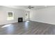 Spacious living room features a fireplace, ceiling fan, and hardwood floors at 128 High Hampton Way, Fuquay Varina, NC 27526