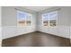 Bright dining room with hardwood floors and wainscoting at 129 Colby Farm Dr, Kenly, NC 27542