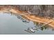 Aerial view of multiple boat slips on a lake at 146 Buoy Dr, Henderson, NC 27537