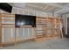 Garage with built-in shelving and cabinets at 157 Winston Pointe Dr, Clayton, NC 27520