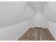 Spacious bonus room with hardwood floors and recessed lighting at 1696 James Winston Rd, Oxford, NC 27565