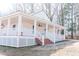 Charming home with a large covered porch, ideal for relaxing and entertaining at 1696 James Winston Rd, Oxford, NC 27565