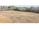 Expansive lot featuring open land with trees bordering the back; perfect for outdoor activities at 1696 James Winston Rd, Oxford, NC 27565