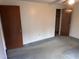 Bedroom with carpet, doors, and simple decor at 201 Providence Rd, Oxford, NC 27565