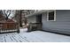 Wooden deck with snow, next to shed and home at 201 Providence Rd, Oxford, NC 27565