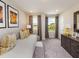 Bright bedroom with built-in bed and window seat at 208 Shingle Oak Rd, Wake Forest, NC 27587