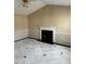 Spacious living room featuring marble floors and a fireplace at 2213 Stephanie Ln, Clayton, NC 27520