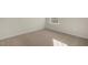 Spacious bedroom with carpeted floor and natural light at 2557 Summersby Dr, Mebane, NC 27302