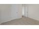 Spacious bedroom with neutral carpeting and ample closet space at 2557 Summersby Dr, Mebane, NC 27302