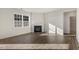 Living room features a corner fireplace and hardwood floors at 2557 Summersby Dr, Mebane, NC 27302