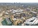 Stunning aerial view of the apartment complex showcasing its design, surroundings and proximity to the city skyline at 29 Enterprise St # 106, Raleigh, NC 27607