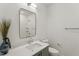 Clean bathroom with single vanity, shower, and toilet at 29 Enterprise St # 106, Raleigh, NC 27607