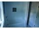 Modern tub/shower combination featuring white tile and a built-in shelf, perfect for relaxation and convenience at 301 W College St, Louisburg, NC 27549