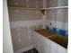 A kitchenette with new white shaker cabinets, ready for your personal touches at 301 W College St, Louisburg, NC 27549