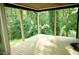 New porch in a wooded setting at 301 W College St, Louisburg, NC 27549
