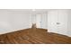 Spacious bedroom with hardwood floors and double doors at 507 Price Ave, Durham, NC 27701