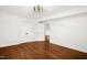 Bright bedroom with hardwood floors and double doors at 507 Price Ave, Durham, NC 27701