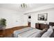 Main bedroom with hardwood floors and access to another room at 507 Price Ave, Durham, NC 27701