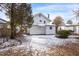Rear view of charming white house with backyard at 507 Price Ave, Durham, NC 27701