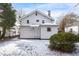 Rear view of charming white house with backyard at 507 Price Ave, Durham, NC 27701