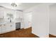 White kitchen with stainless steel appliances at 507 Price Ave, Durham, NC 27701