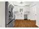 Modern kitchen with white cabinets and hardwood floors at 507 Price Ave, Durham, NC 27701