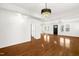 Bright living room with hardwood floors and chandelier at 507 Price Ave, Durham, NC 27701
