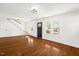 Hardwood floors and open concept living space with staircase at 507 Price Ave, Durham, NC 27701