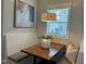 Quaint breakfast nook with built-in seating, perfect for enjoying morning meals in a naturally lit setting at 54 Cottage Way Way, Pittsboro, NC 27312