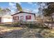 Ranch home with red shutters, deck, and large yard at 602 E Club Blvd, Durham, NC 27704