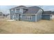 The backyard features newly installed siding and a blank plot ready for customization at 62 Faircox Way # 139, Garner, NC 27529