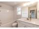 Bright bathroom features a tub and shower combination and single vanity at 62 Faircox Way # 139, Garner, NC 27529