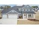 Charming two-story home featuring a three-car garage and classic design at 62 Faircox Way # 139, Garner, NC 27529