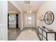 Bright foyer featuring elegant console table and luxury vinyl plank flooring at 62 Faircox Way # 139, Garner, NC 27529
